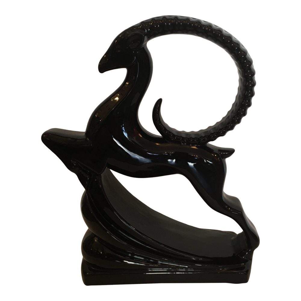 Impressive 1950's decorative ceramic ibex sculpture in motion. Made by Haeger, one of the leading makers of decorative objects in the 20th century and maintaining its original sticker on the bottom. Perfect example of mid-century decorative objects. Dimensions:16ʺW × 6ʺD × 20ʺH Condition:Very Good Condition, Original Condition Unaltered, No Imperfections Condition Note: Perfect Styles: Figurative, Mid-Century Modern, Modern Materials:Ceramic